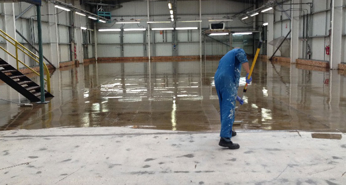 applying clear floor coating