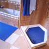 blue kumfi flex anti slip mat in bathroom