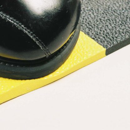 close up of yellow and black kumfi tex foam mat