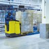 yellow forklift in storage warehouse