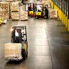 Forklift driving on industrial flooring