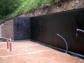 A liquid waterproof membrane applied to exterior wall