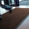 brown aqua mat in doorway